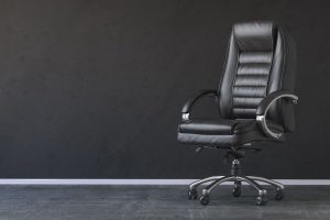 black office chair with dark background