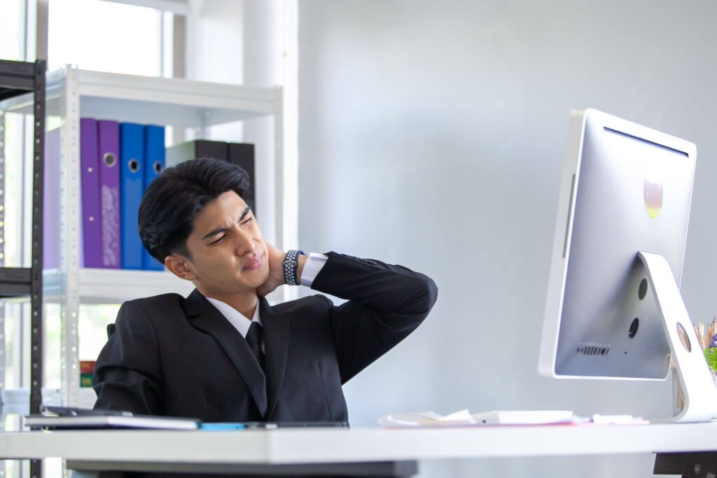 male worker having neck discomfort