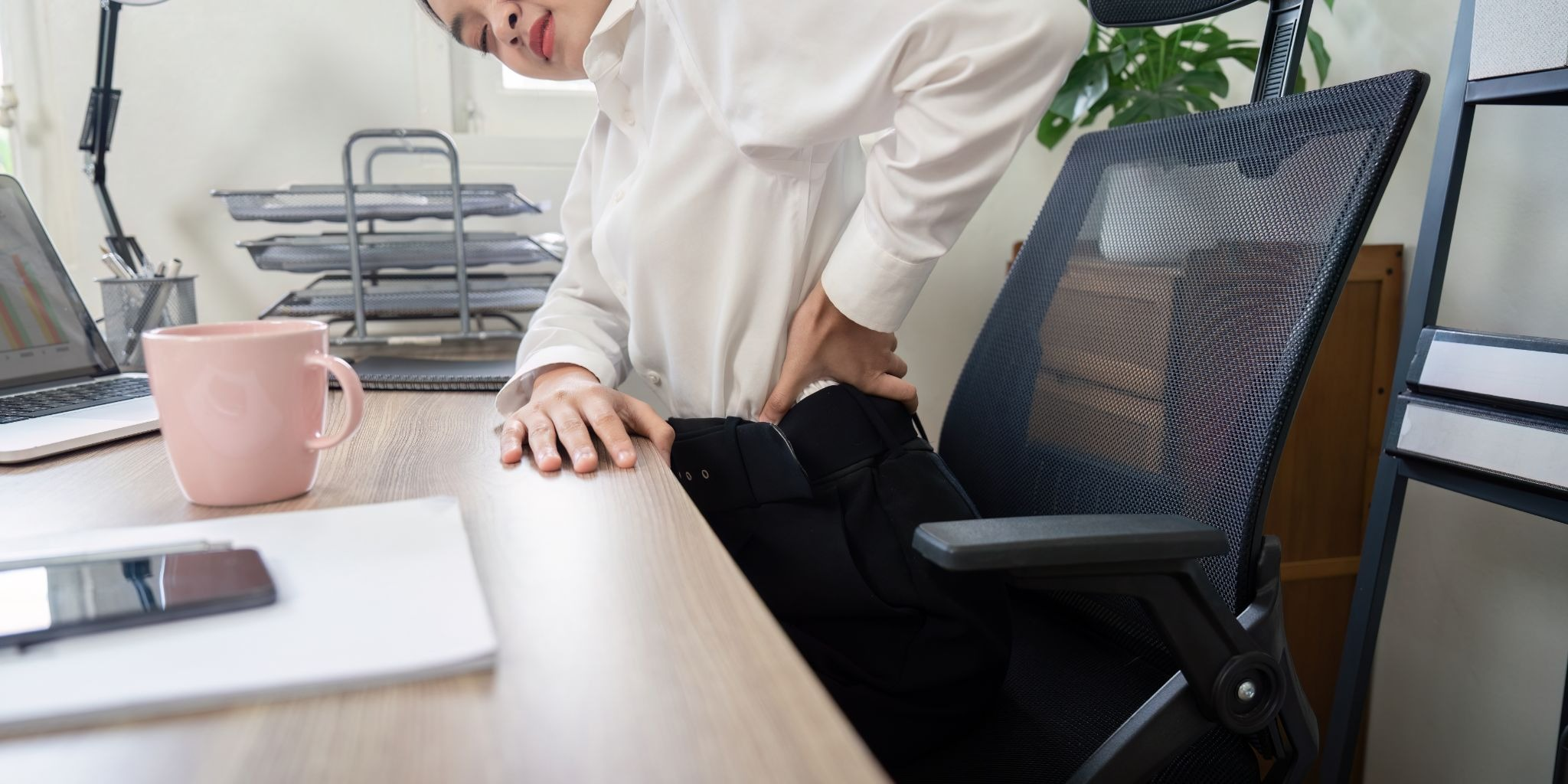 female worker having back pain