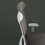 A close-up, side-profile detail of the grey Surface high-back office chair. 